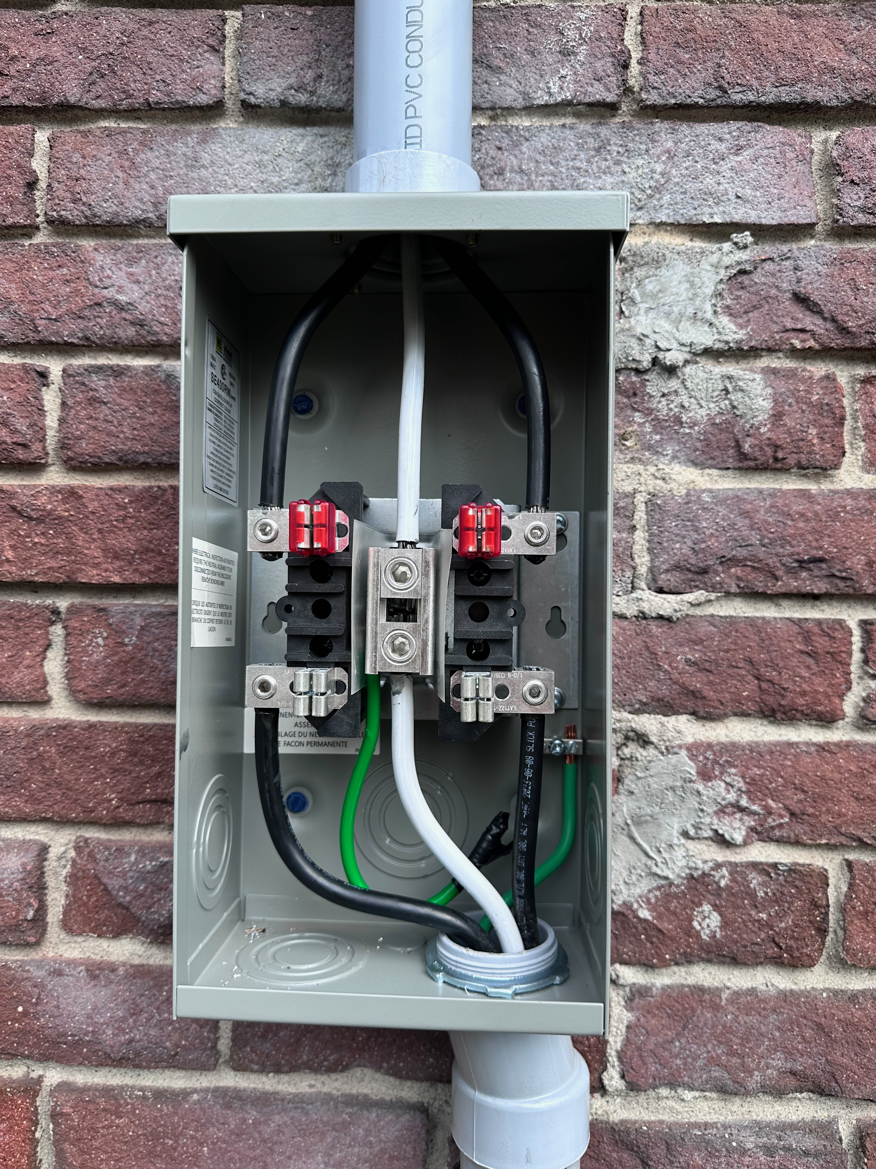 Meter base and service equipment prepared for ESA inspection on an Ottawa home.